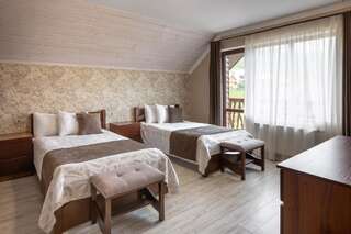 Отель Carparosa Hotel Буковель Улучшенный двухместный номер с 2 отдельными кроватями и балконом-1
